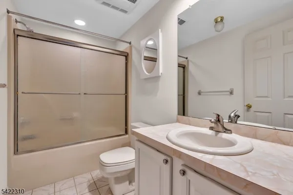 a view of hallway with livingroom