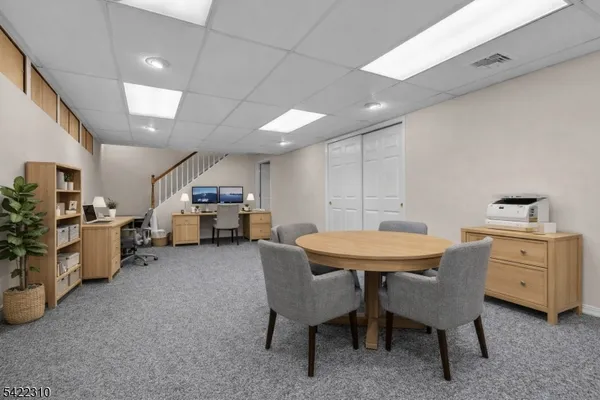 a view of a chair and table and chair in the garden