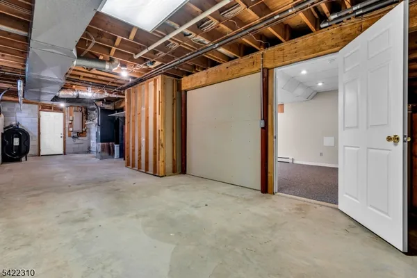 a front view of house with yard and outdoor seating
