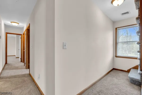 a view of garage and yard