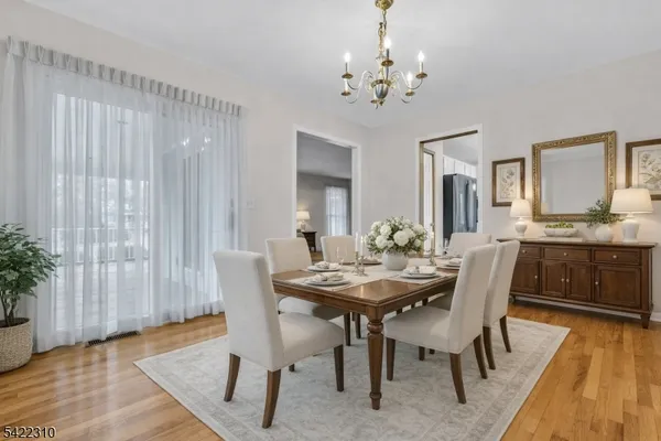 a kitchen with stainless steel appliances a stove a refrigerator and a cabinets