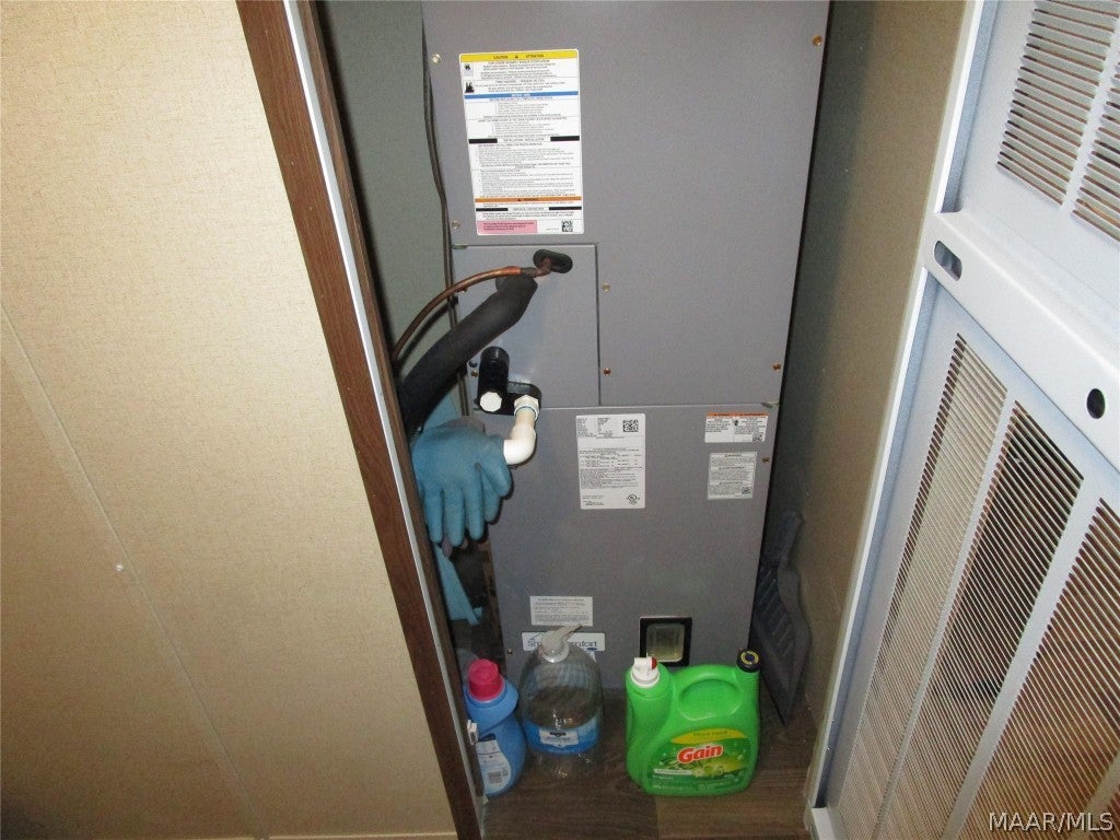 110 Aplin Street Samson, AL 36477 - Photo 11 of 43 HVAC UNIT IN LAUNDRY CLOSET