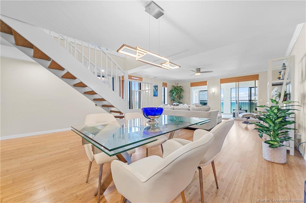4651 Northeast Ocean Boulevard, Unit B26 Stuart, FL 34996 - Photo 15 of 35 a living room with furniture and a potted plant