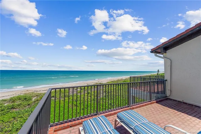 a balcony with a yard