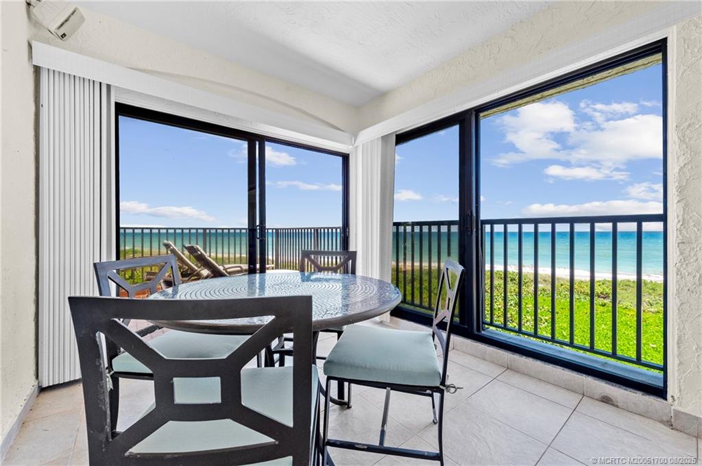 4651 Northeast Ocean Boulevard, Unit B26 Stuart, FL 34996 - Photo 6 of 35 a view of a livingroom with furniture and window