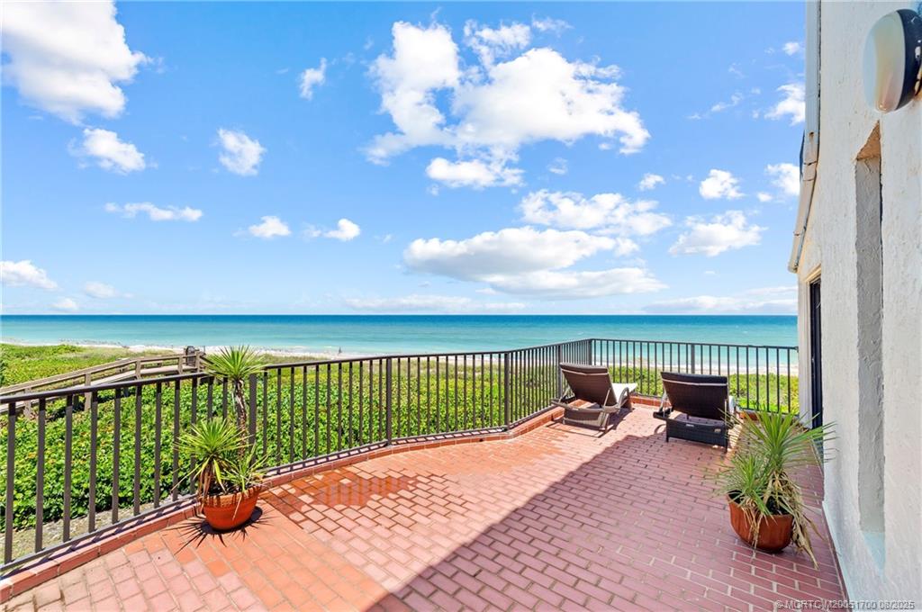 4651 Northeast Ocean Boulevard, Unit B26 Stuart, FL 34996 - Photo 7 of 35 a terrace view with a garden