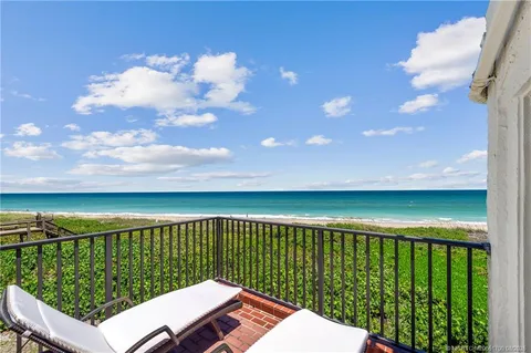 a balcony with an ocean view