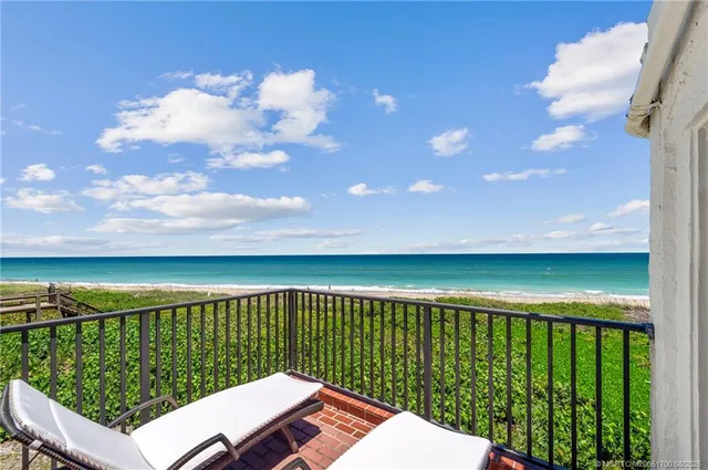 a balcony with an ocean view