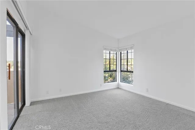 a view of cabinets with wooden floor