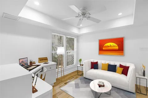 a workspace with furniture and window