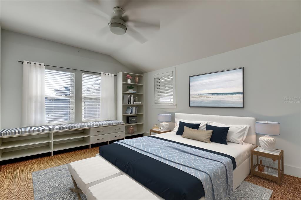 2605 Pass A Grille Way St. Pete Beach, FL 33706 - Photo 25 of 41 a bedroom with bed and window