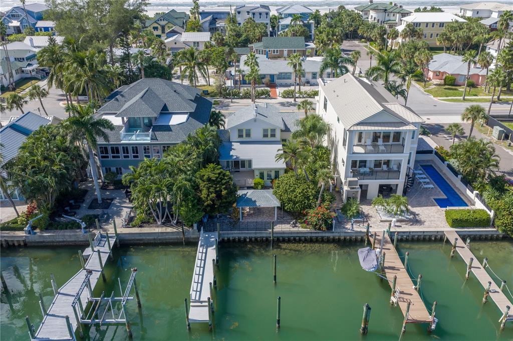 2605 Pass A Grille Way St. Pete Beach, FL 33706 - Photo 34 of 41 an aerial view of a house with a lake view