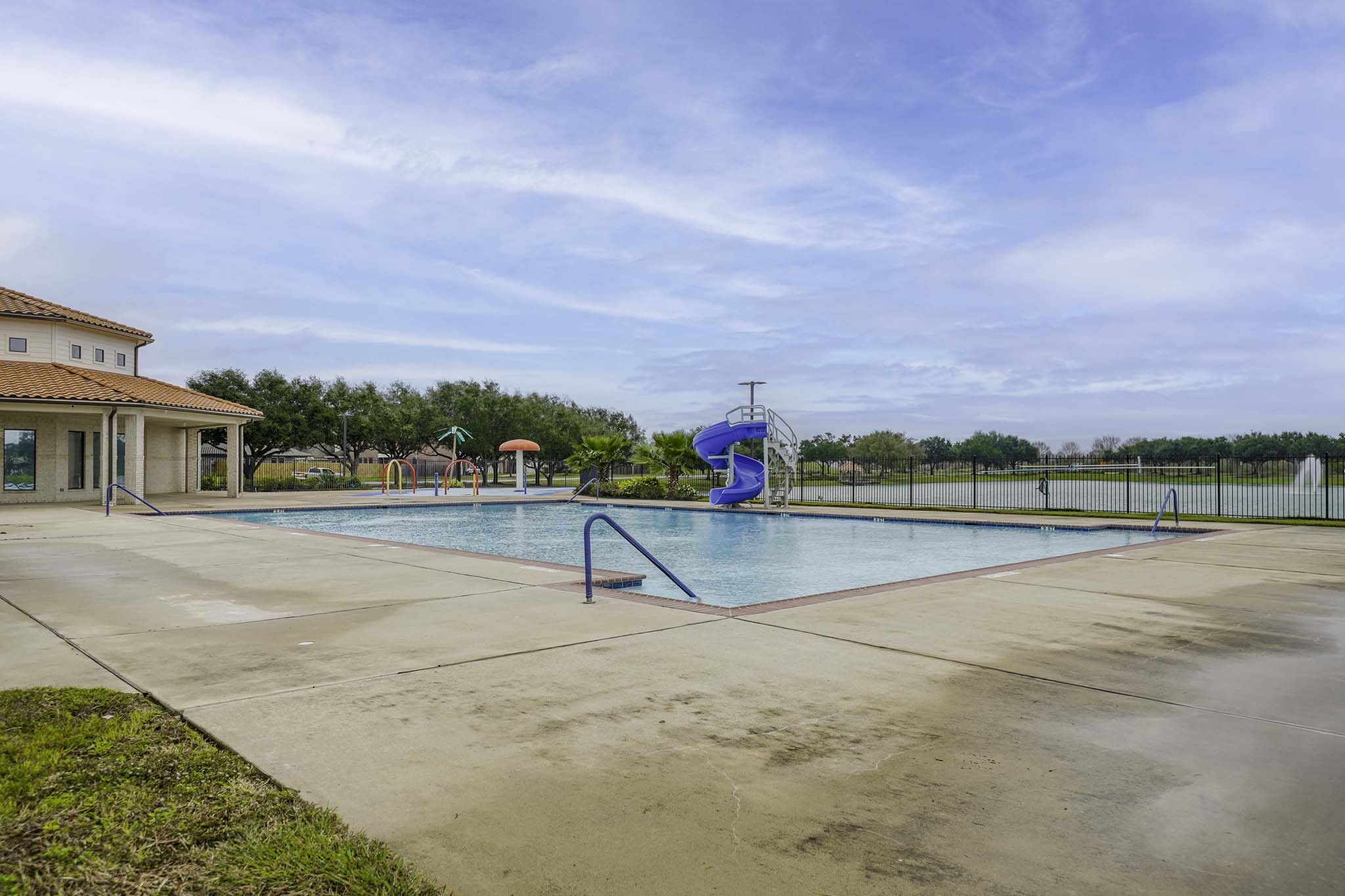 121 Rodeo Drive Manvel, TX 77578 - Photo 22 of 22 a view of an outdoor space and lakeside