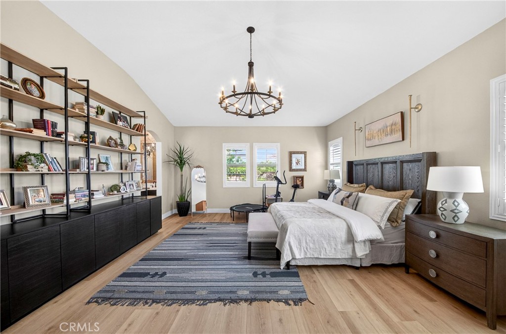 16375 Ory Circle Riverside, CA 92503 - Photo 22 of 51 a bedroom with bed and wooden floor