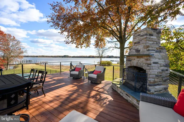 an outdoor living with seating area