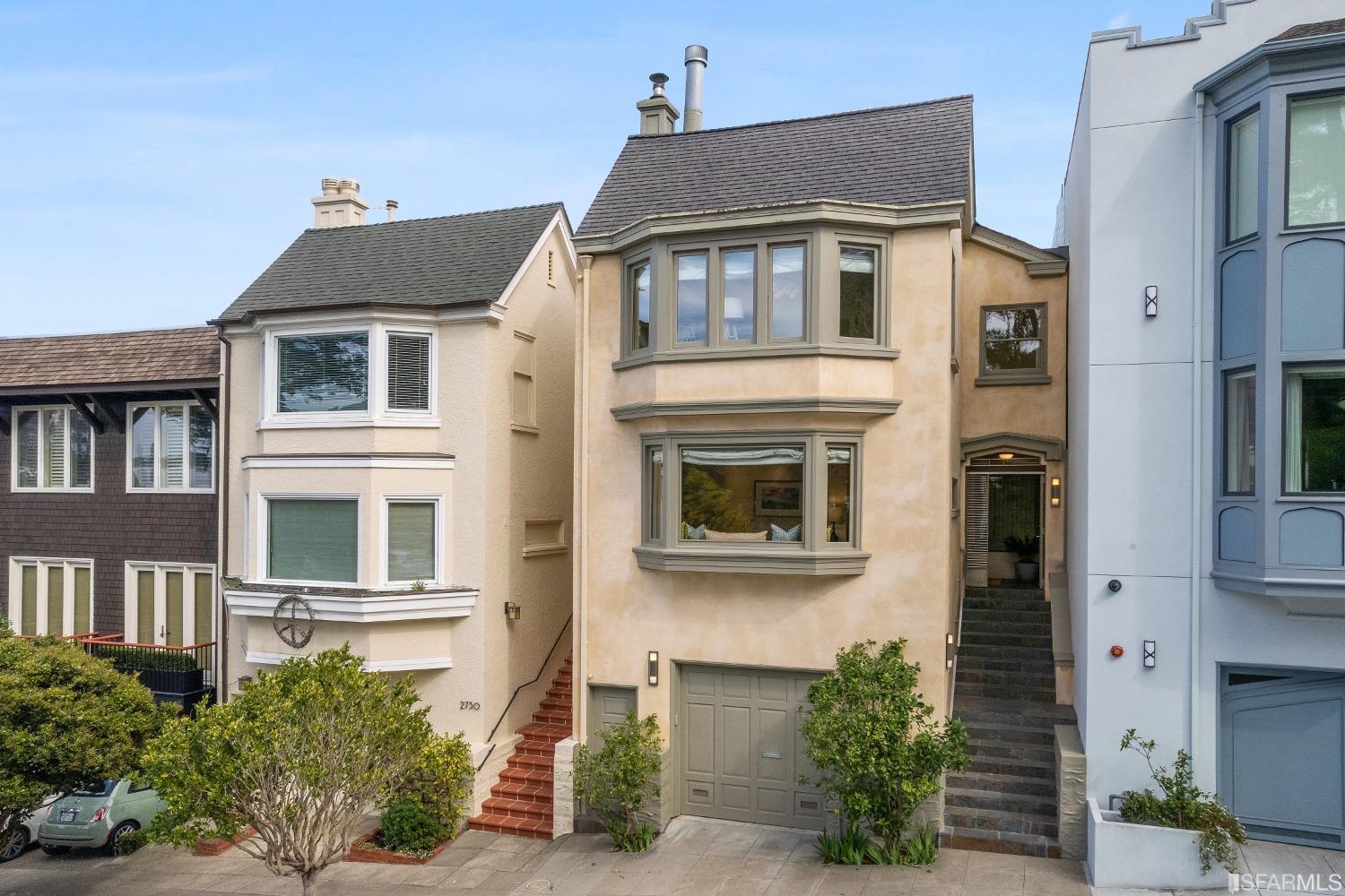 Lyon Street San Francisco, CA 94123 - Photo 1 of 55 a front view of a house with a yard