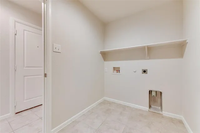 a view of a backyard with wooden fence
