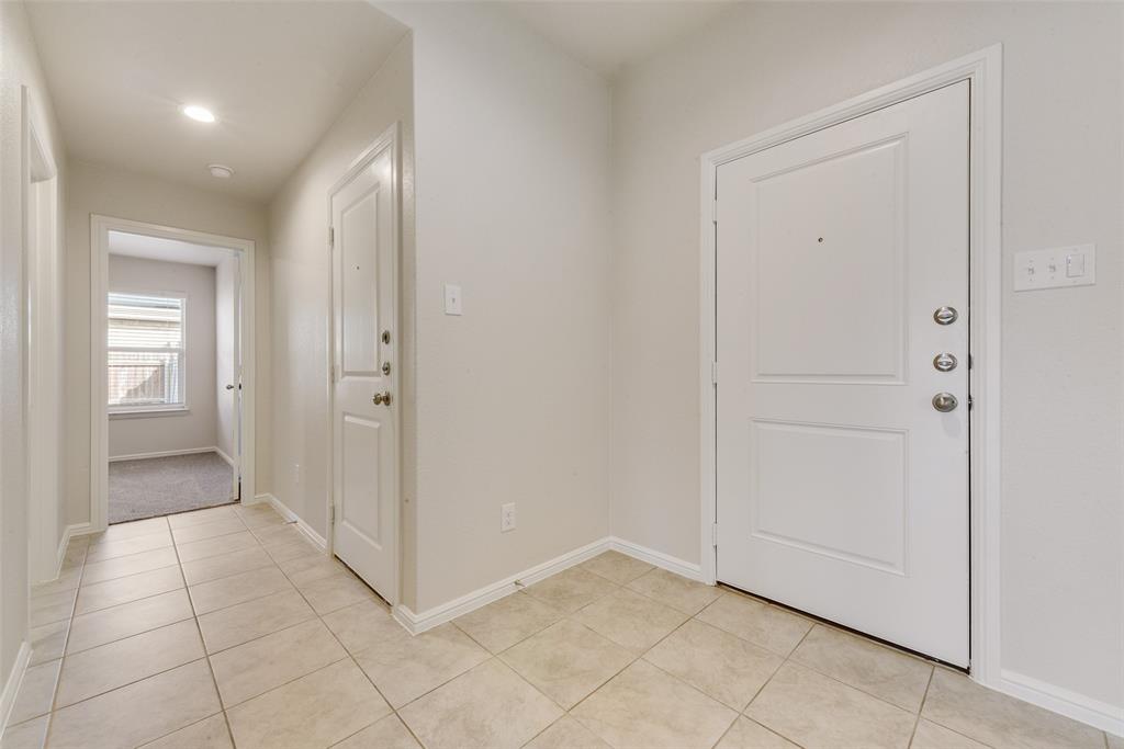 711 Durango Lane Cleburne, TX 76033 - Photo 3 of 26 a view of a hallway