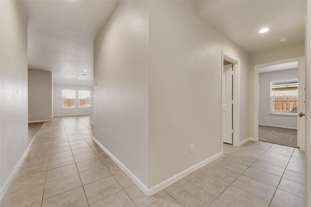 711 Durango Lane Cleburne, TX 76033 - Photo 4 of 26 a view of a hallway