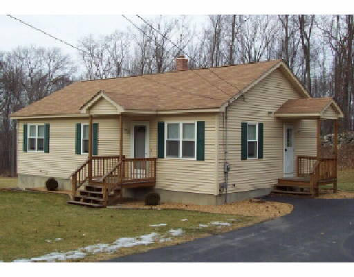 47 Hartness Road Sutton, MA 01590 - Photo 1 of 1 a view of a yard in front of a house