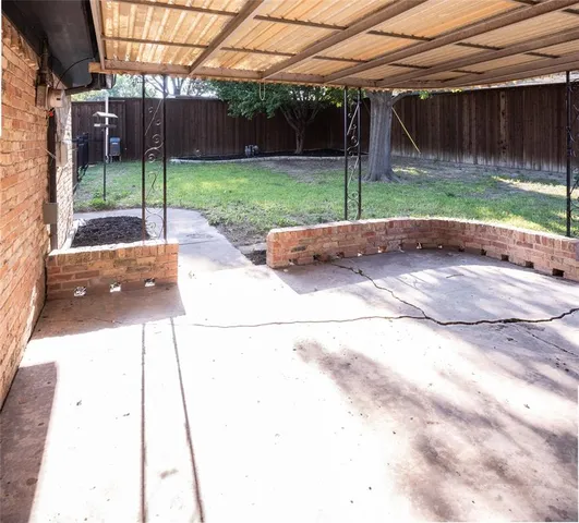 a backyard of house with lots of green space