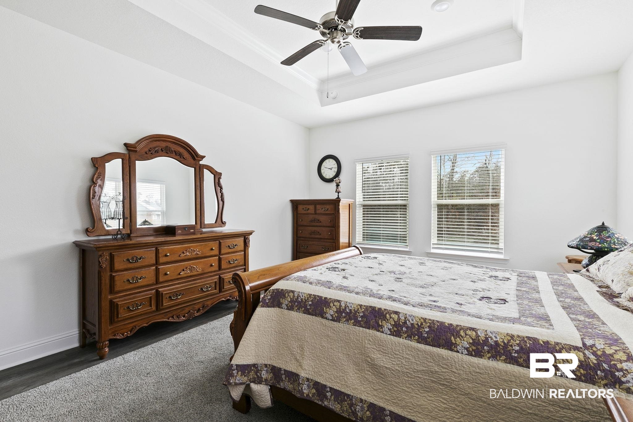 1141 Pencarro Boulevard Foley, AL 36535 - Photo 31 of 70 Bedroom with ceiling fan and a tray ceiling