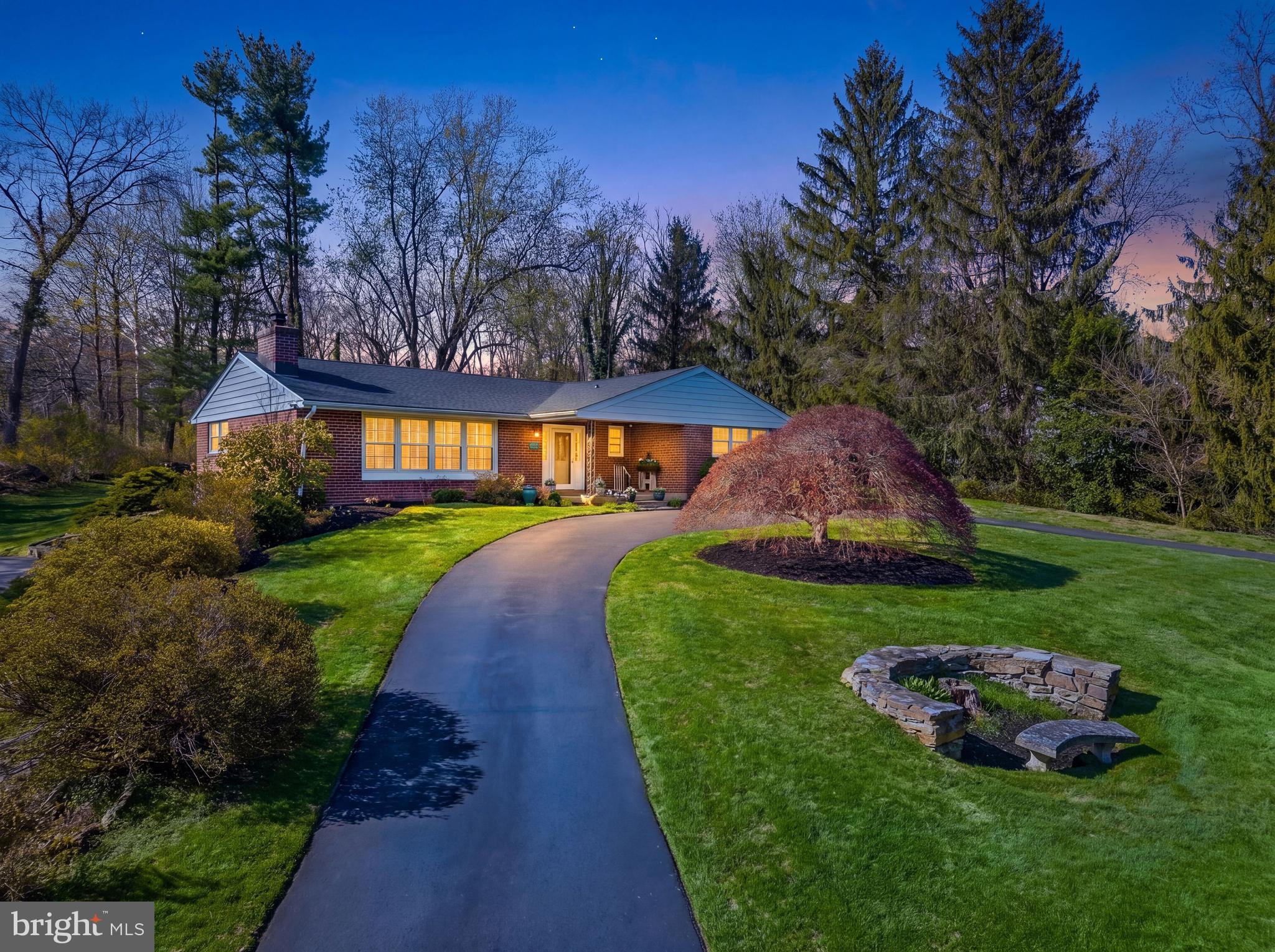 709 Alene Road Ambler, PA 19002 - Photo 32 of 42 a view of a garden with a swimming pool