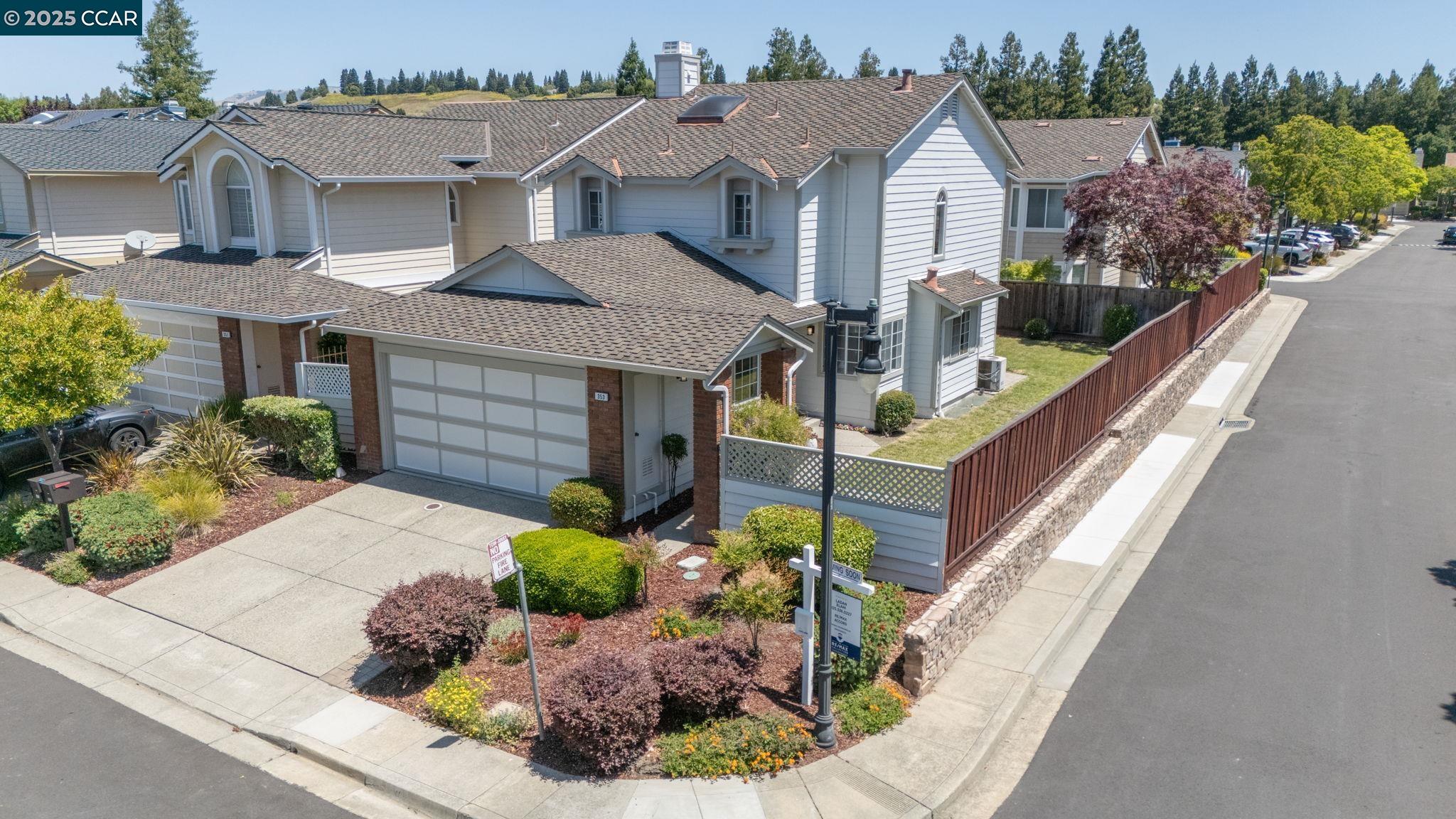 353 Winterwind Circle San Ramon, CA 94583 - Photo 1 of 1 a front view of a house with a yard potted plants