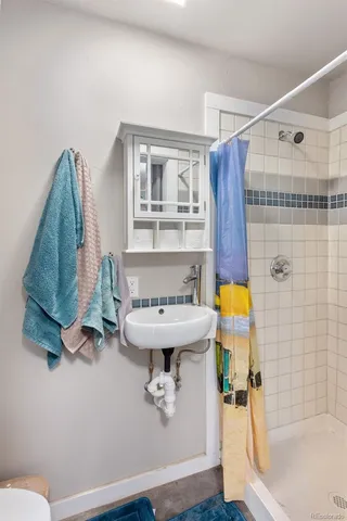 a bathroom with a sink and bathtub