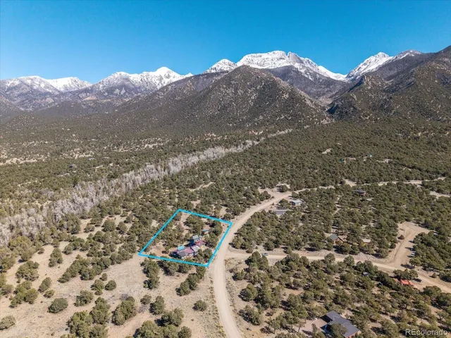 a view of a house with a mountain