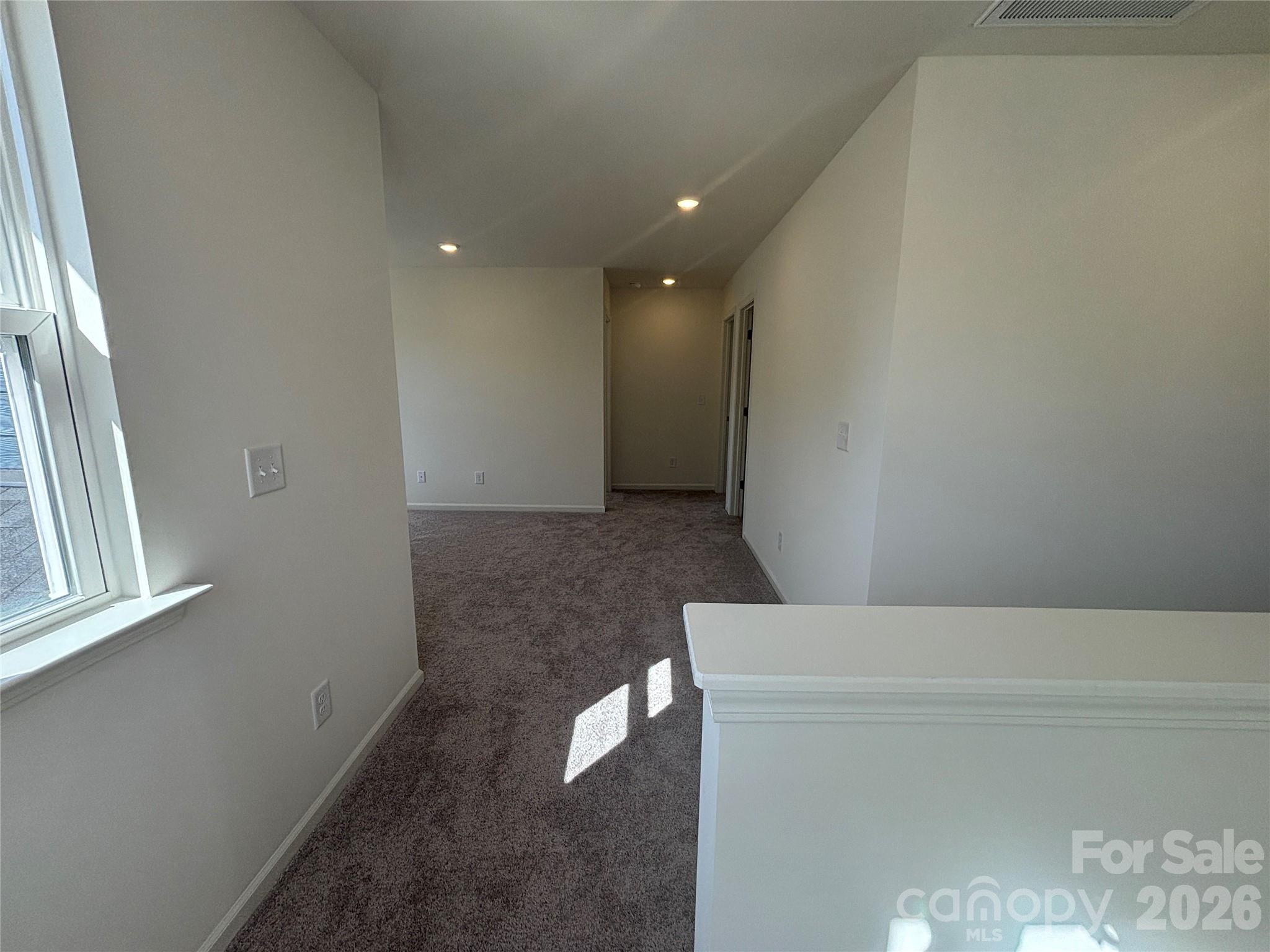 357 Roxanna Lane, Unit 72 York, SC 29745 - Photo 9 of 23 a view of an empty room and a window