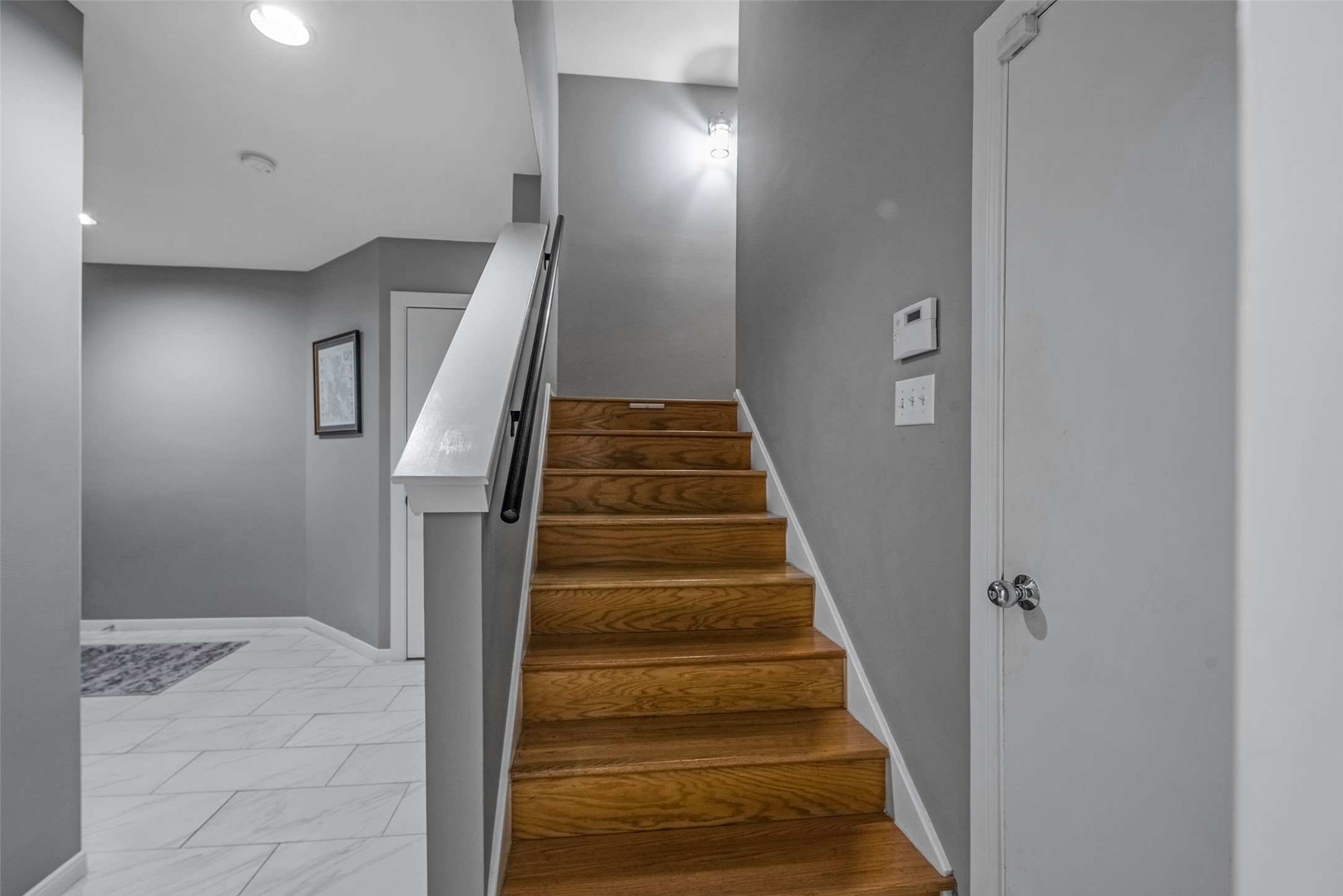 1028 La Rue Street Houston, TX 77019 - Photo 9 of 29 Stairs to the second floor. Battery powered lighting on the stairs.