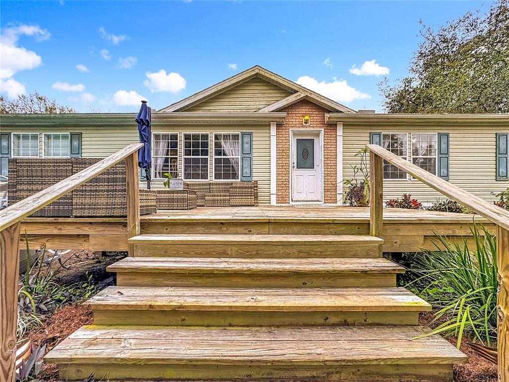 3230 Empire Church Road Groveland, FL 34736 - Photo 2 of 29 a view of house with outdoor space