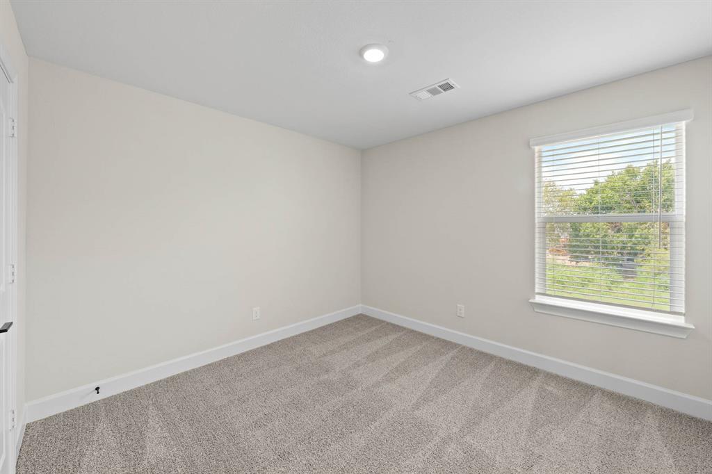 497 MB's Way Pilot Point, TX 76258 - Photo 6 of 8 an empty room with a window
