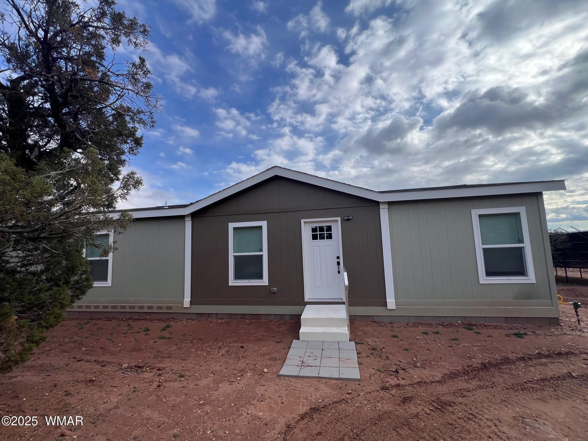 4129 Apache Road Snowflake, AZ 85937 - Photo 1 of 48 a house with a yard
