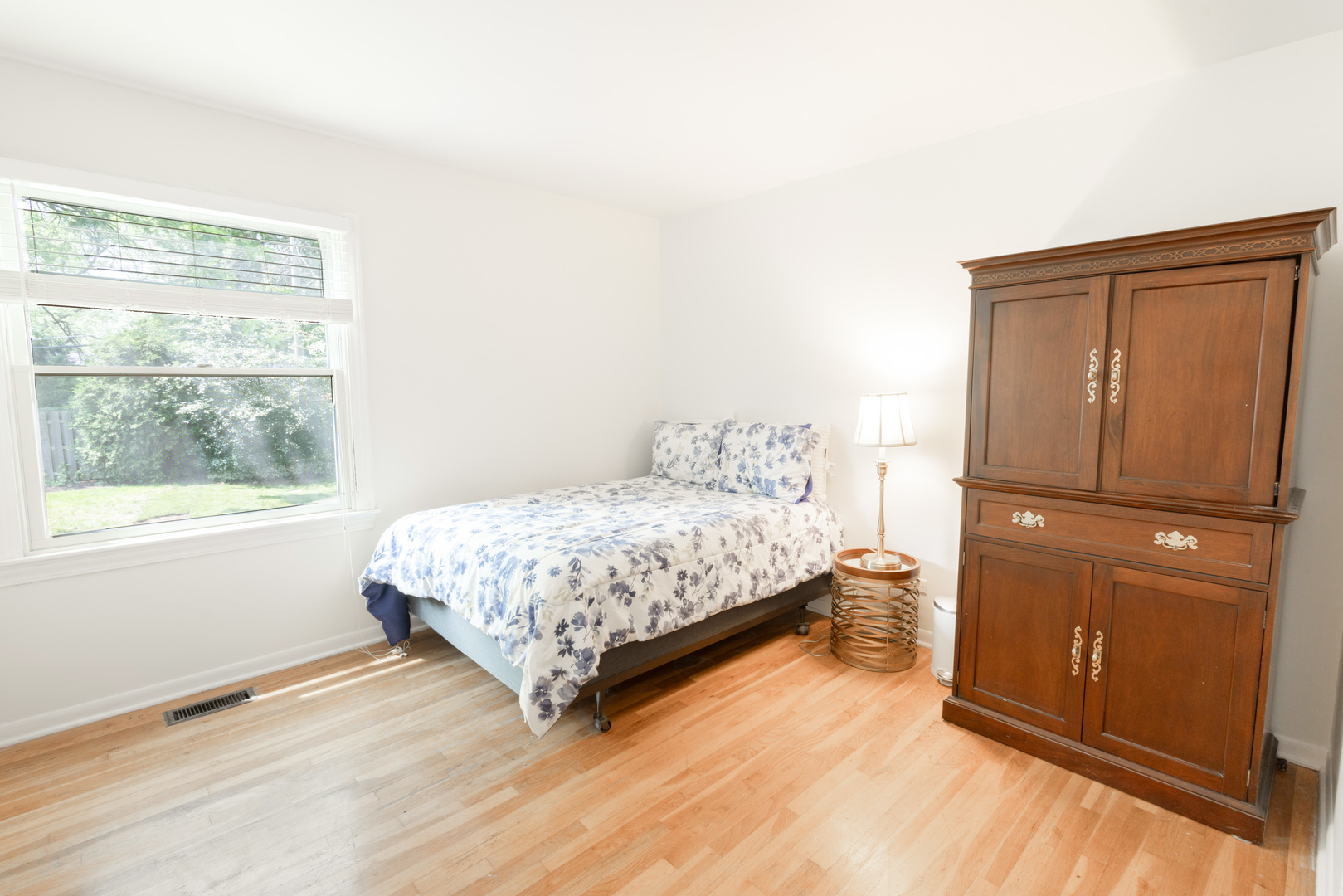 N244 Peter Road Winfield, IL 60190 - Photo 12 of 20 a bedroom with a bed window and mirror