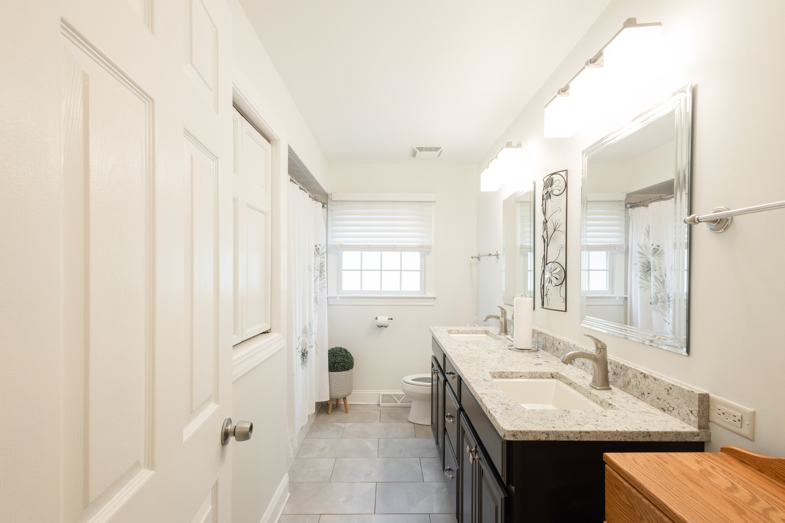 N244 Peter Road Winfield, IL 60190 - Photo 14 of 20 a bathroom with a sink and a mirror
