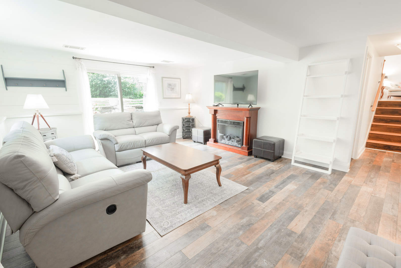 N244 Peter Road Winfield, IL 60190 - Photo 15 of 20 a living room with furniture a fireplace and a table