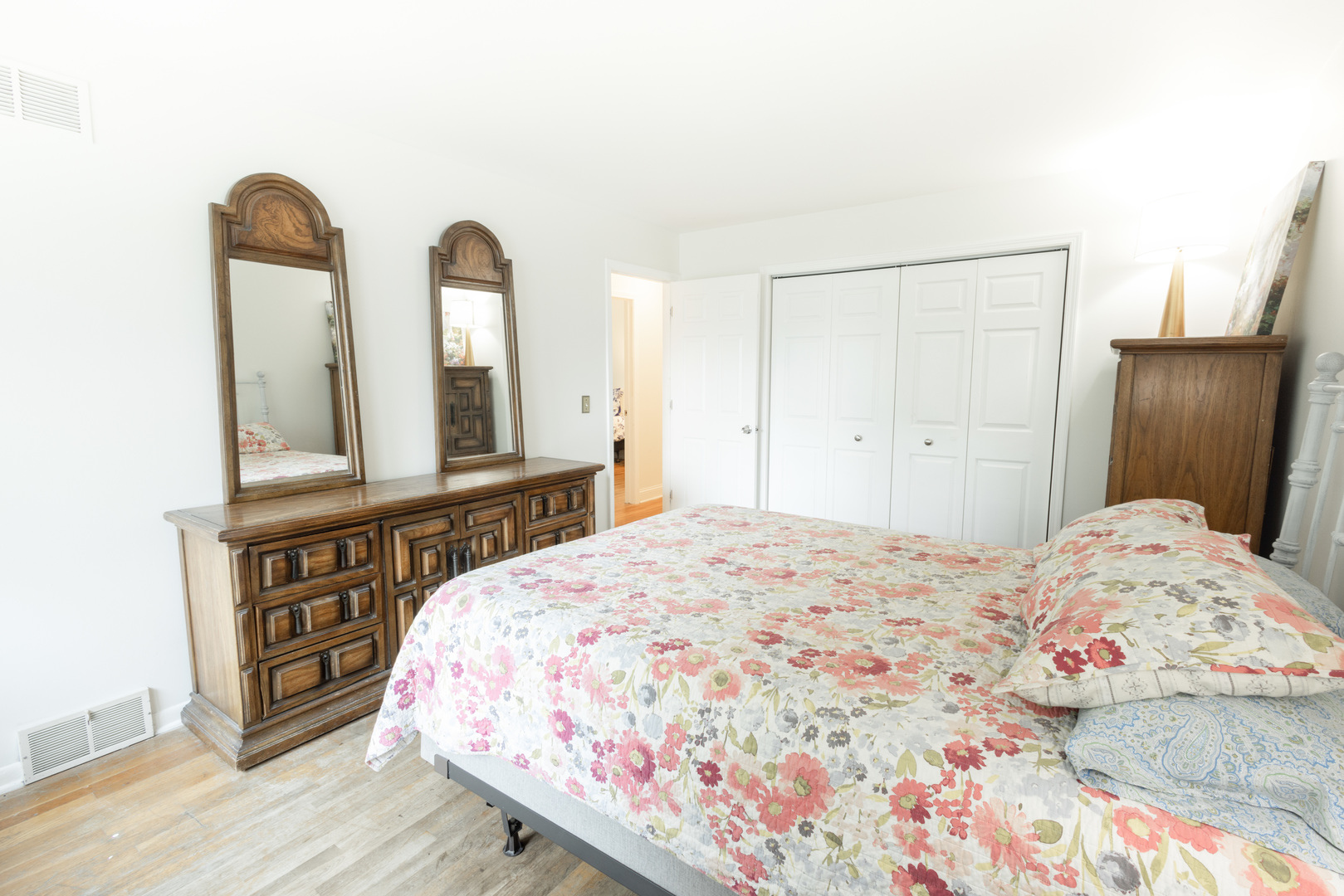 N244 Peter Road Winfield, IL 60190 - Photo 9 of 20 a bedroom with a bed and a dresser with mirror