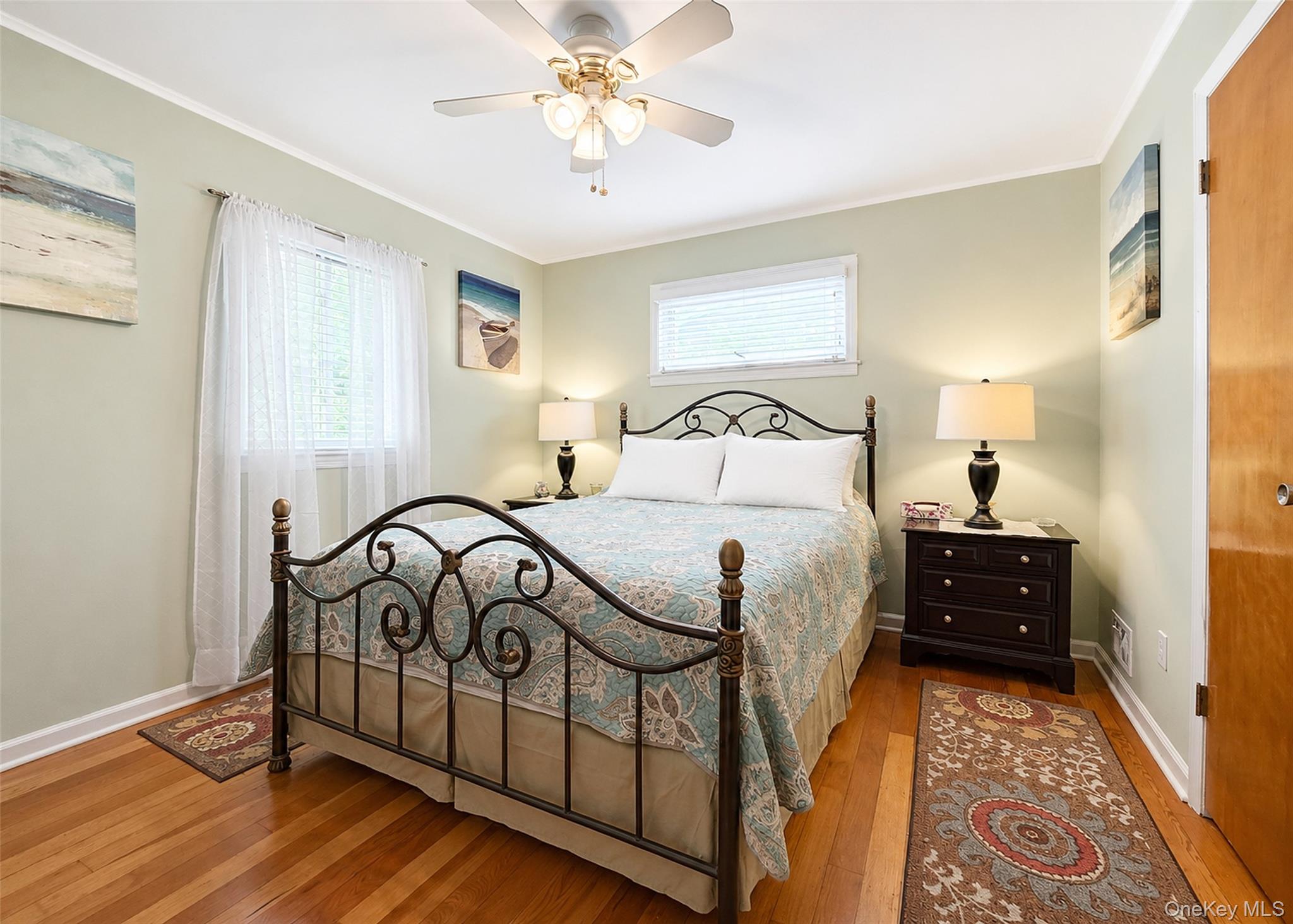 17 Beech Road Rocky Point, NY 11778 - Photo 11 of 26 Primary Bedroom With Hardwood Flooring, Ceiling Fan, & Ample Closet Space.