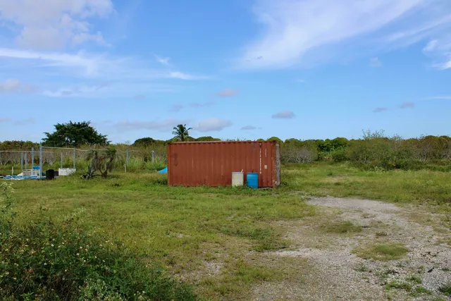 a view of a lake with a big yard