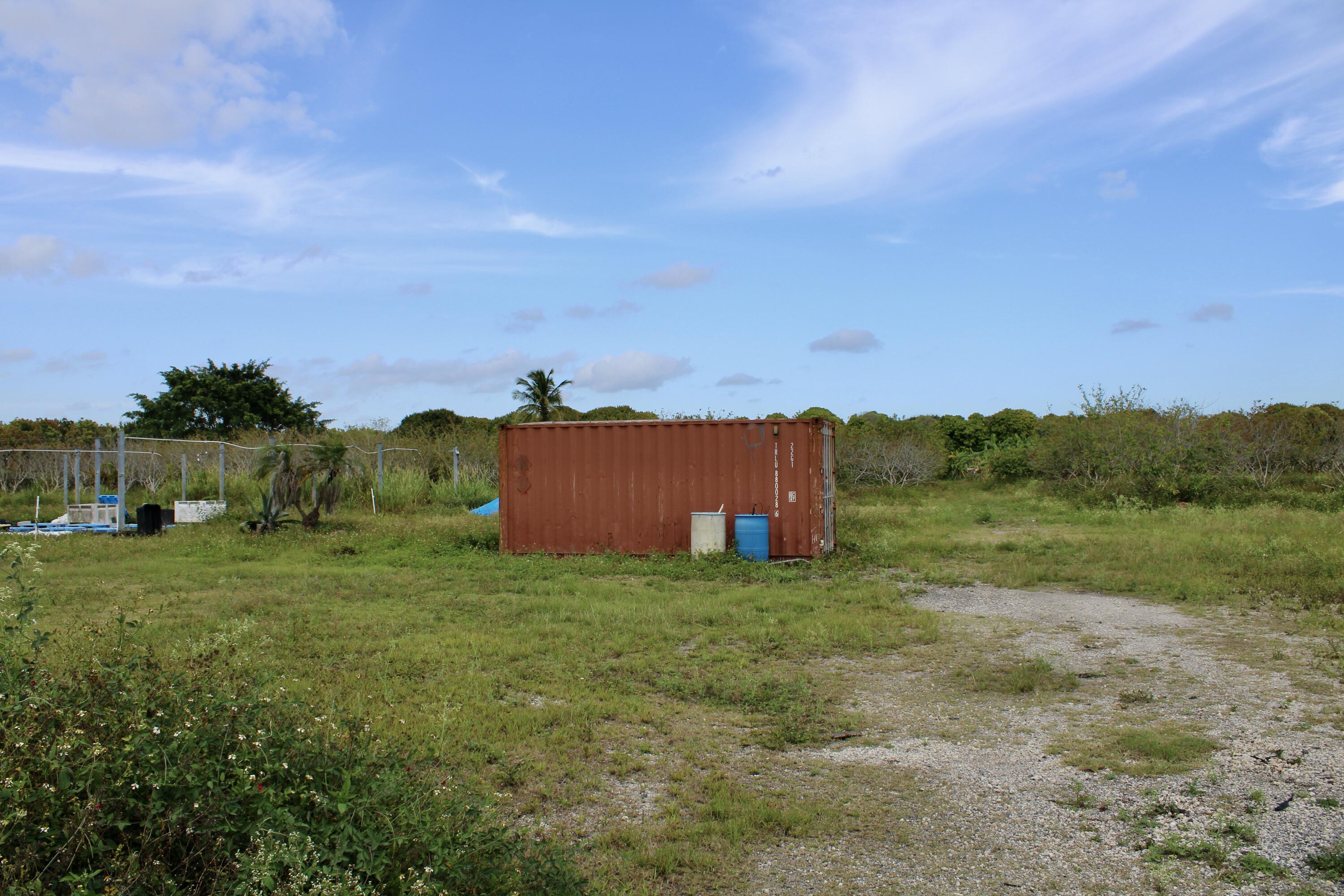 180 Southwest 187th Avenue Miami, FL 33187 - Photo 14 of 27 a view of a big yard with green space