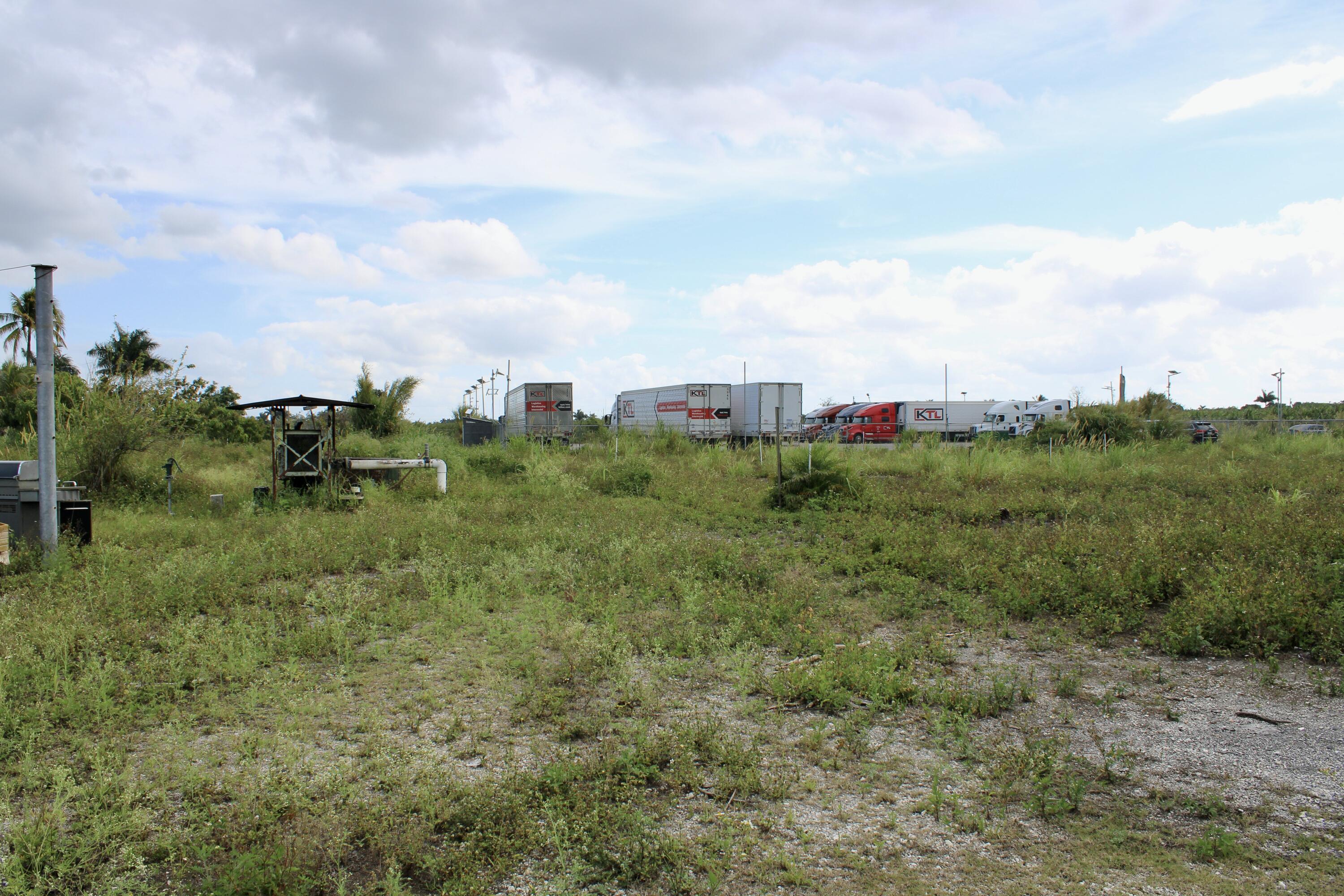180 Southwest 187th Avenue Miami, FL 33187 - Photo 19 of 27 a view of a green field with lots of plants in it