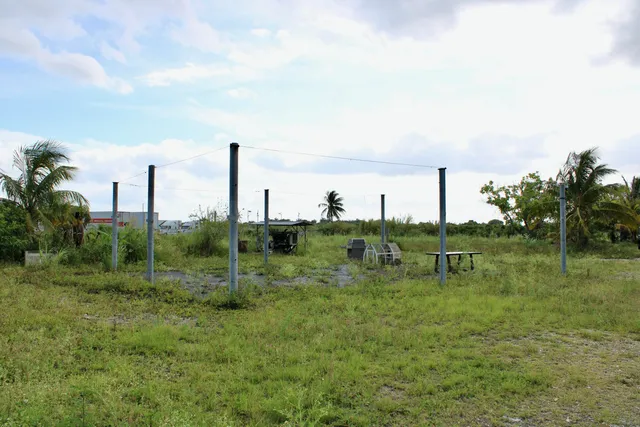 a view of a lake with a yard