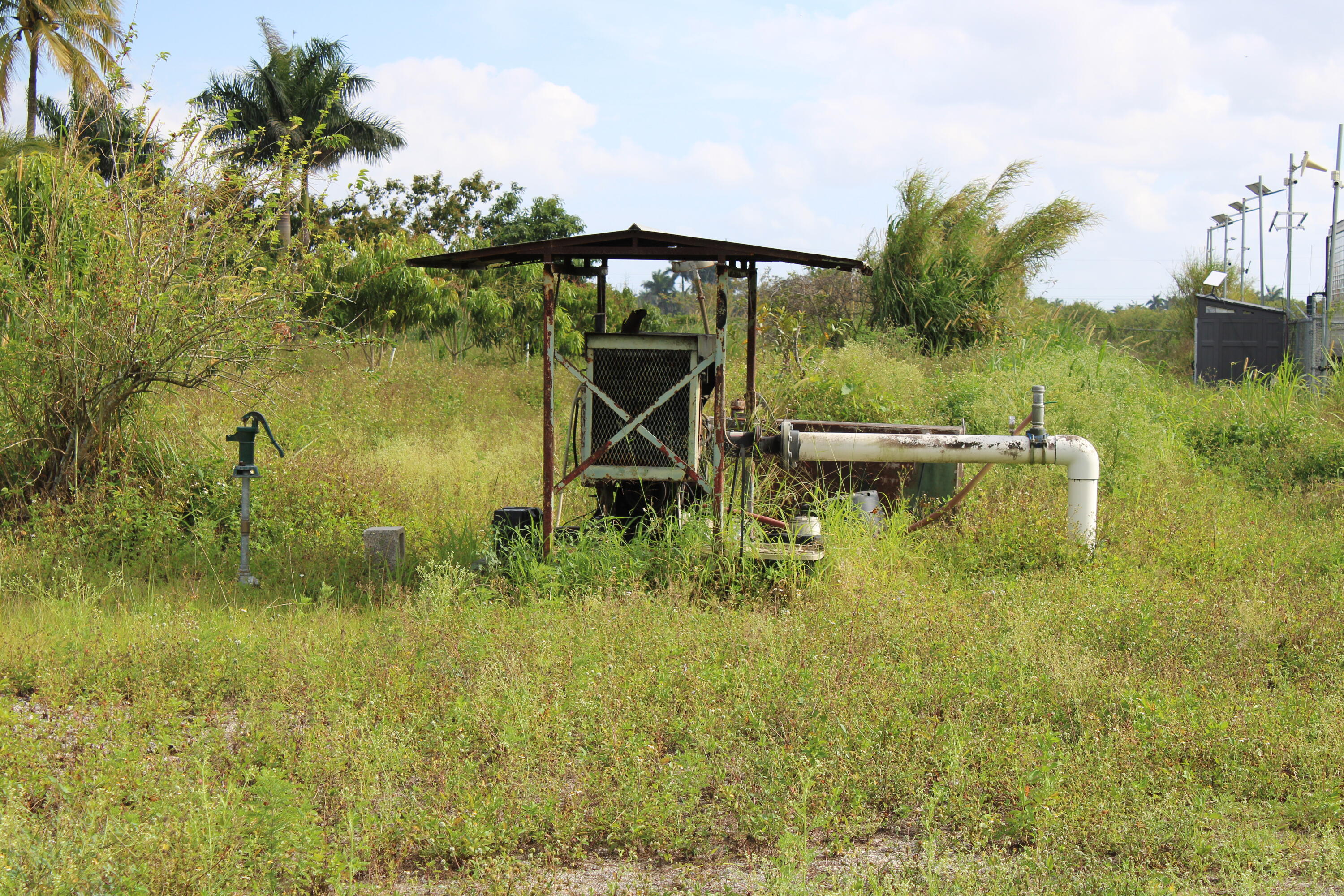 180 Southwest 187th Avenue Miami, FL 33187 - Photo 27 of 27 a view of a lake with a yard