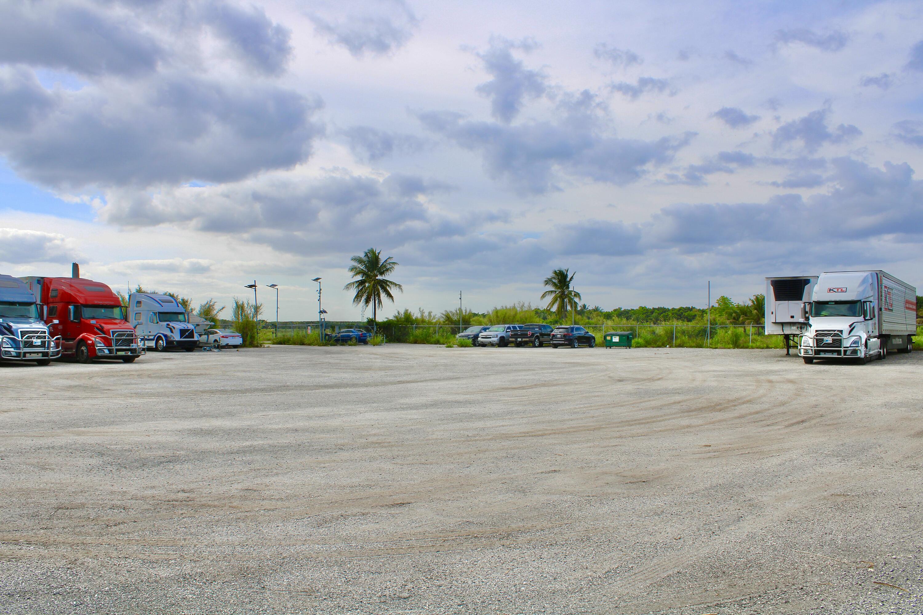 180 Southwest 187th Avenue Miami, FL 33187 - Photo 3 of 27 a view of street with cars
