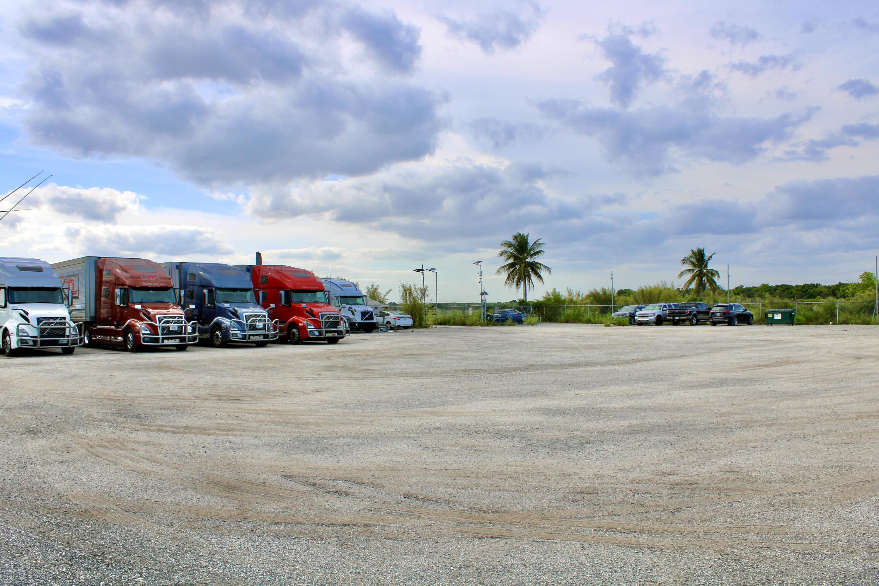 180 Southwest 187th Avenue Miami, FL 33187 - Photo 4 of 27 a view of street with cars