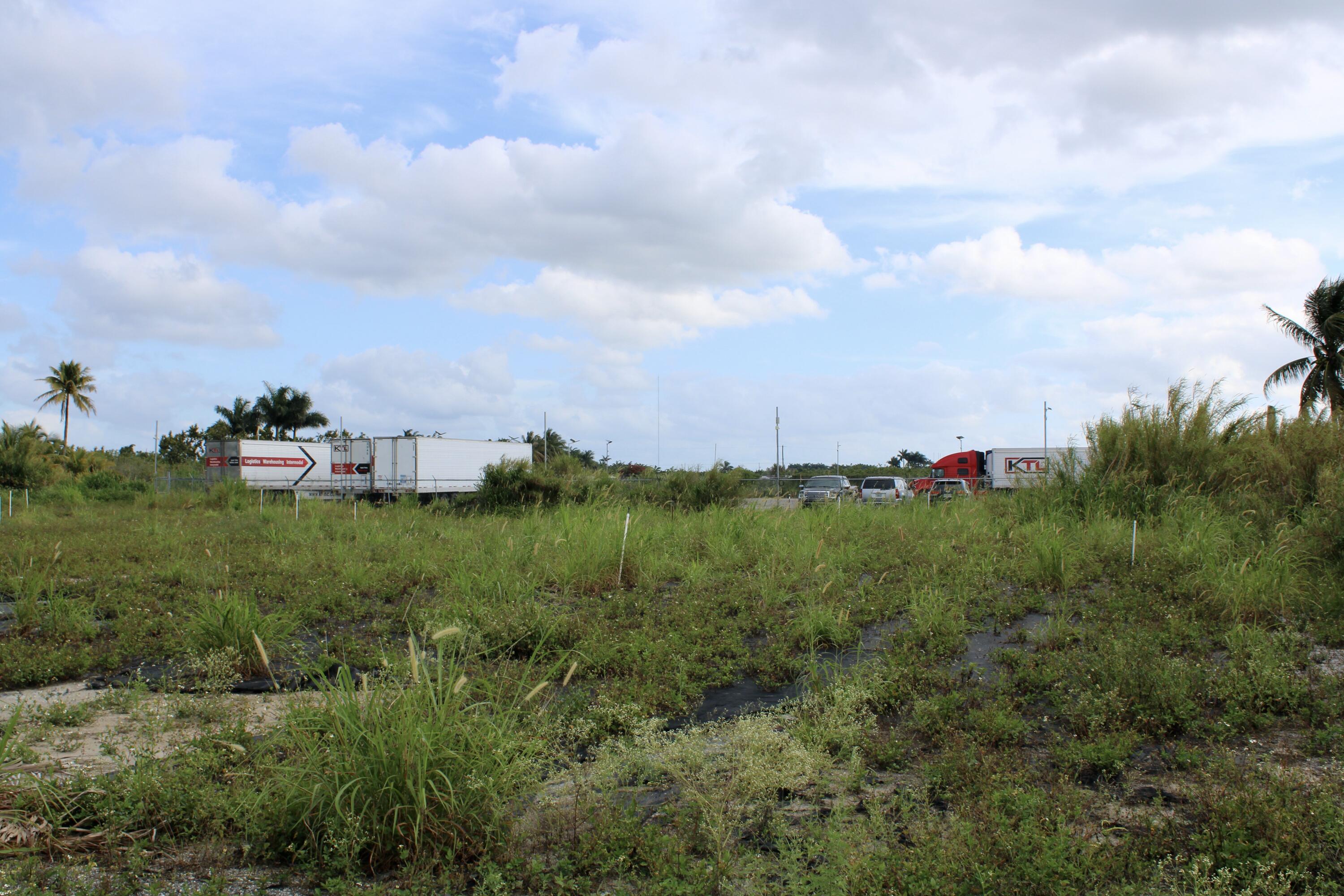 180 Southwest 187th Avenue Miami, FL 33187 - Photo 9 of 27 a view of a houses with a garden