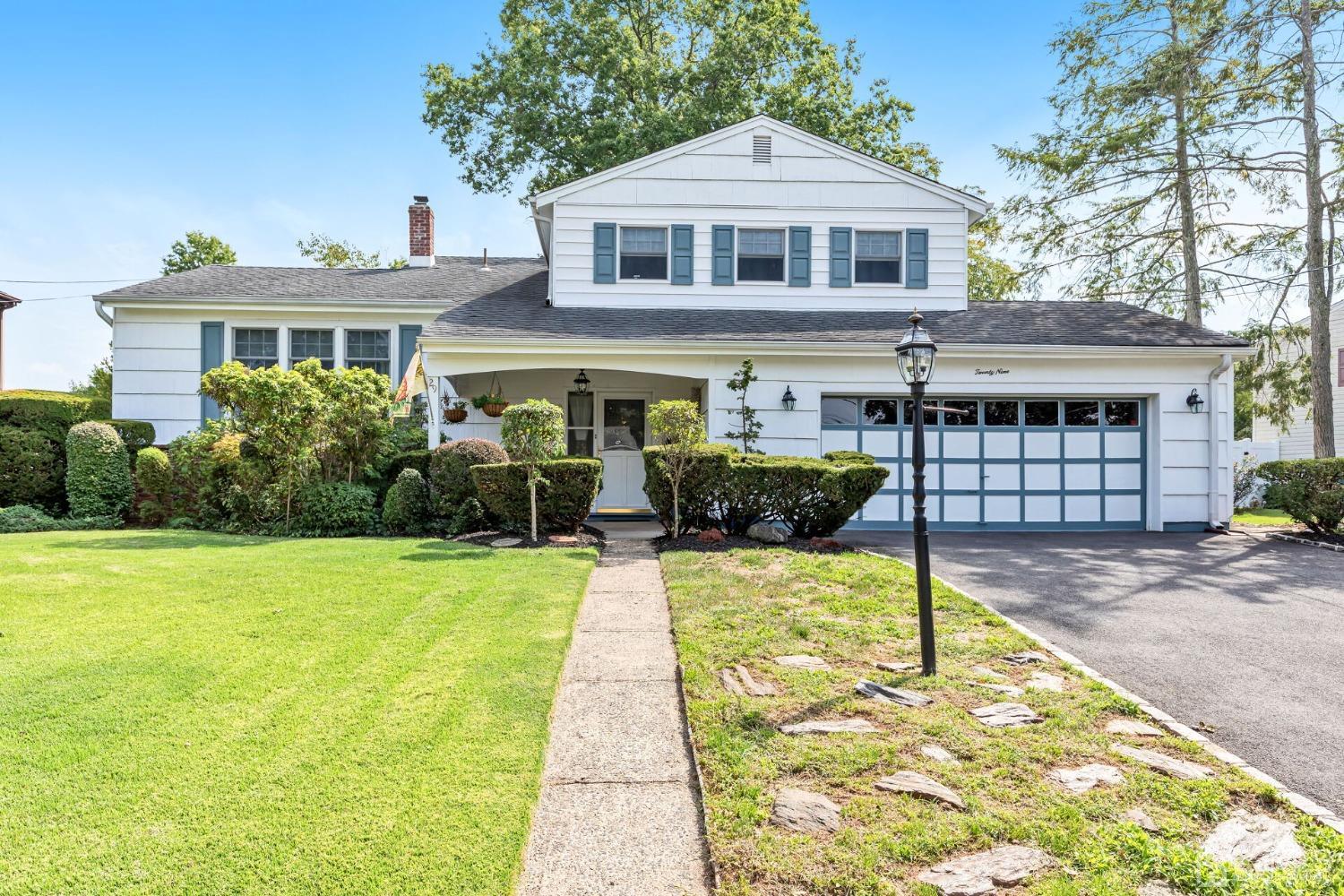 29 Hunt Road Somerset, NJ 08873 - Photo 1 of 41 a front view of a house with garden