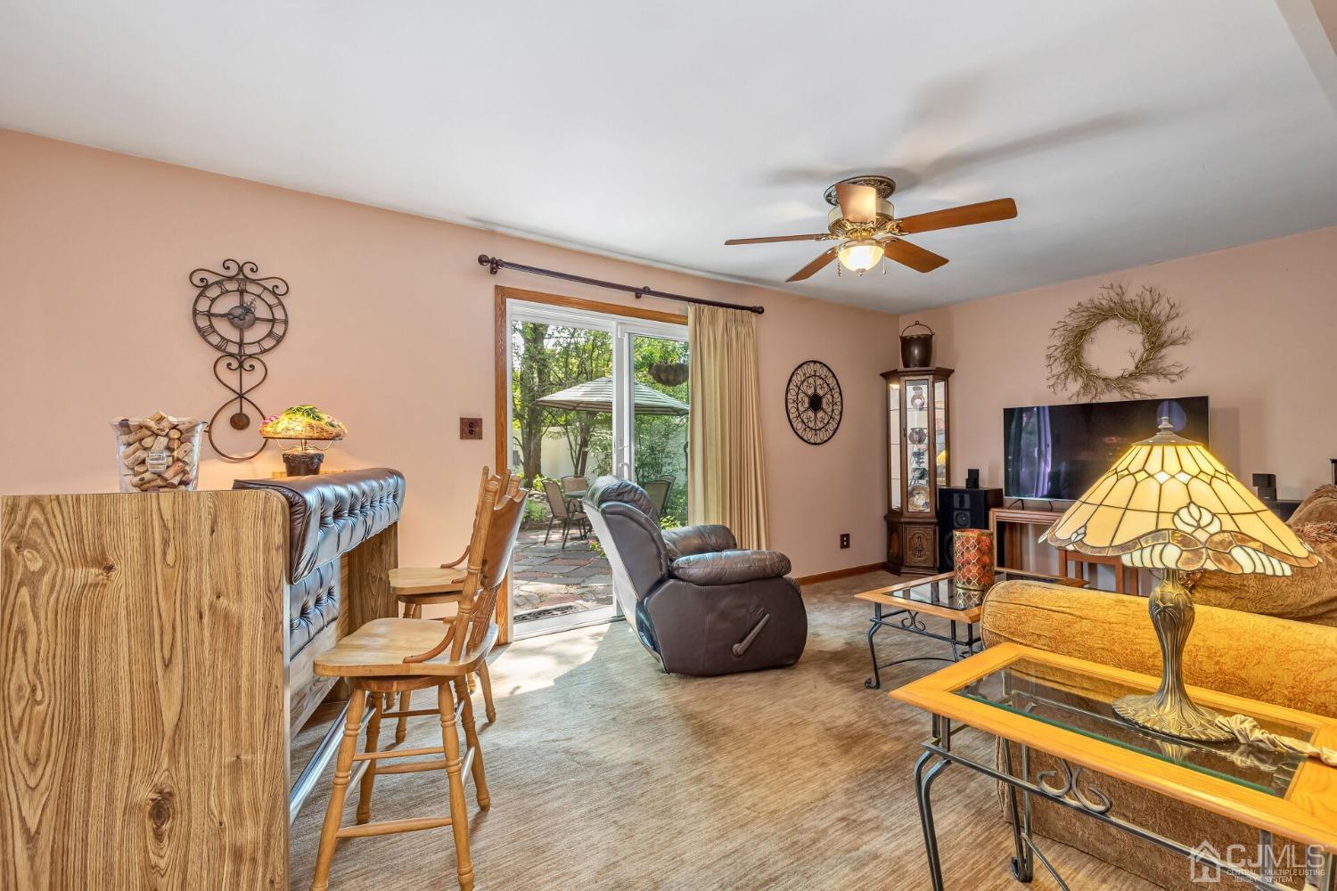 29 Hunt Road Somerset, NJ 08873 - Photo 14 of 41 a living room with furniture and a large window